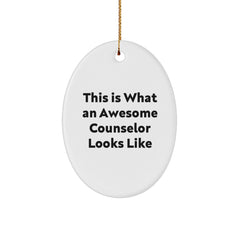 Funny Counselor Gifts, 'This Is What An Awesome Counselor Looks Like' Oval Ornament, White, Christmas Unique Gifts from Friends to Counselors - Image 1