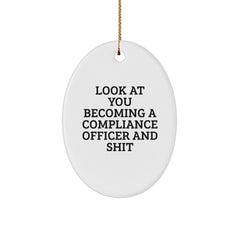 Funny Compliance Officer Gifts for Him, Oval Ornament with 'Look At You Becoming A Compliance Officer And Shit' Humor, Gifts from Men, Perfect Office Christmas Unique Decorations - Image 1