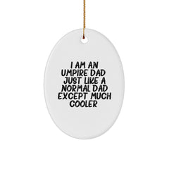 Funny Umpire Dad Gifts for Umpire Lovers, Oval Ornament for Christmas Unique Gifts from Dad, 'I Am An Umpire Dad...' - Image 1