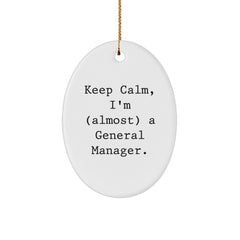 General Manager Gifts from Friends for Christmas - 'Keep Calm, I'm (almost) A General Manager.' Oval Ornament, Christmas Unique Gifts for Her or Him - Image 1