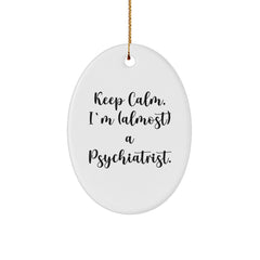 Funny Psychiatrist Gifts, Oval Ornament for Men, Women, Friends - Keep Calm, I'm (almost) A Psychiatrist. - Unique Christmas Unique Gift Ideas, Present for Psychiatrist Office Decor - Image 1