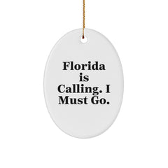 Florida Calling Oval Ornament, Funny Quote Gifts from Friends for Men, Women, Family, 'Florida Is Calling. I Must Go.' Christmas Oval Ornament - Image 1